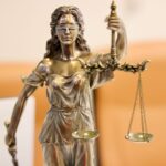 Detailed image of Lady Justice statue, symbolizing fairness and impartiality.