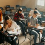 Students studying seriously in a Buenos Aires classroom setting during the day.