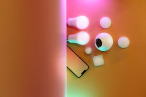 A flat lay of smart bulbs and devices, creating a vibrant tech ambiance.